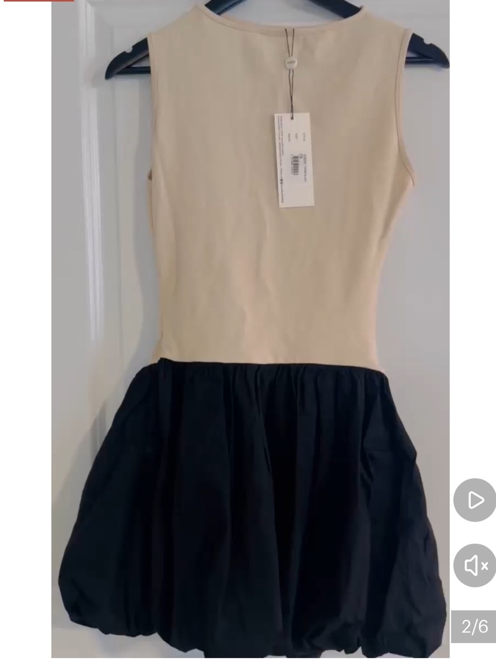 Sleeveless Cream Top with Black Skirt